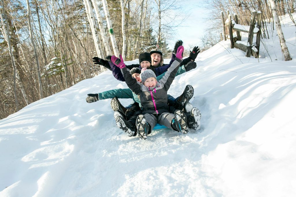 sledding at Wanoga Sno-Park or dog-sledding, one of Sunriver winter activities